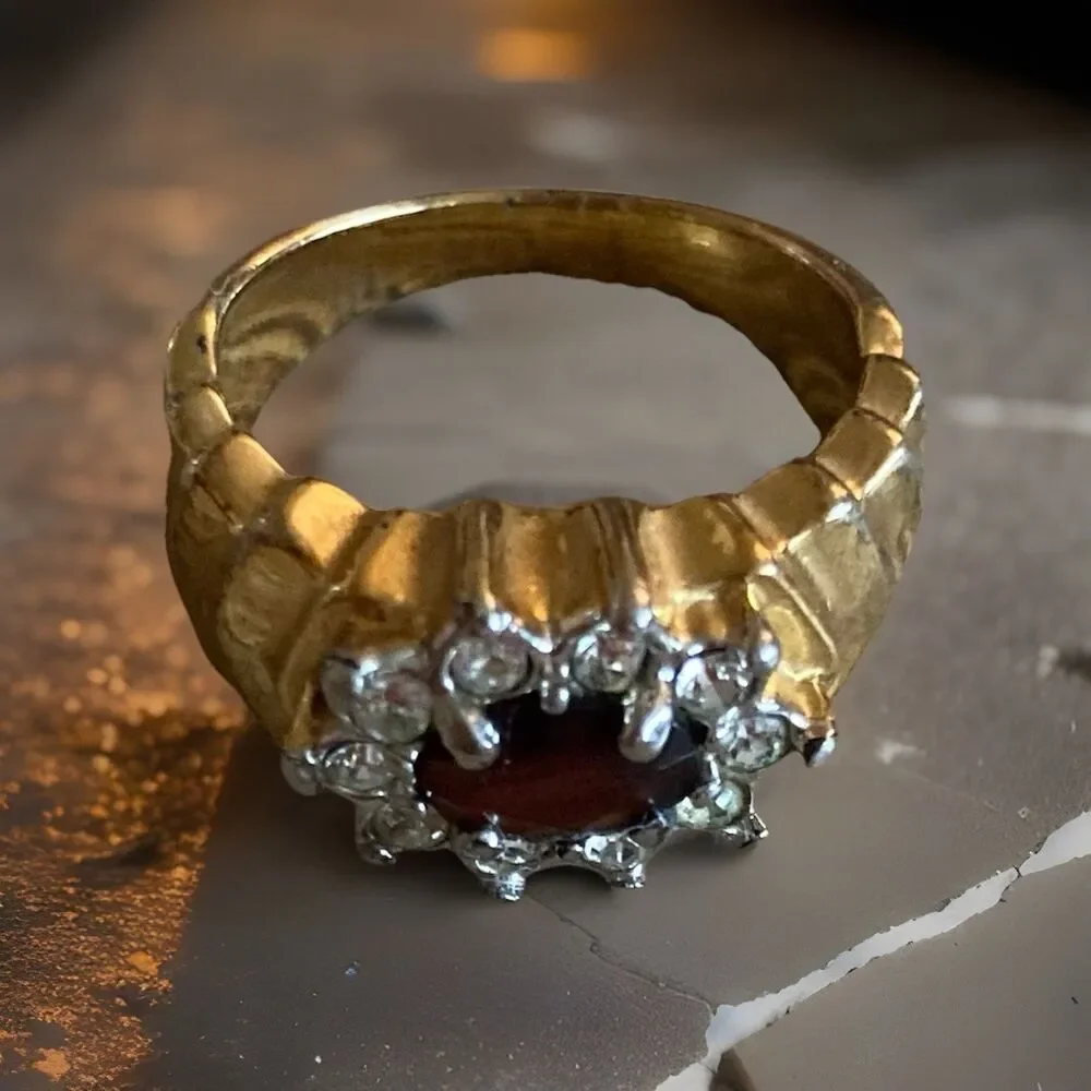 Cluster ring oval red center stone clear surrounding stones size 7.5